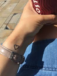 The heart is a ubiquitous symbol of love in tattoos. Heart Tattoo On Wrist Heart Tattoo Wrist Small Heart Wrist Tattoo Small Hand Tattoos