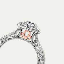The 1934 Diamond Engagement Ring Featuring The Rose Gold Angel Set In 18ct White Gold Brown Engagement Rings Jewelry Inspiration Diamond Engagement Rings