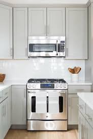 Above The Stove Microwave Transitional Kitchen Trendy Kitchen Tile Shaker Kitchen Cabinets Grey Shaker Kitchen