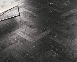 Herringbone tiles can be used to create an attractive, luxurious effect anywhere in your home, from feature walls to kitchen floors. Black Tile Herringbone Floor Novocom Top