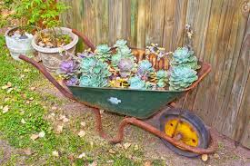 33 Wheelbarrow Planter Ideas For Your Garden Wheelbarrow Garden Wheelbarrow Planter Wheelbarrow