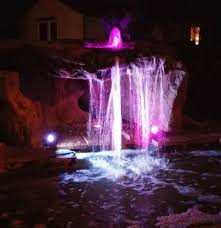 The Grand Grotto Waterfalls Formation With Purple Led Lights Rock Waterfall Waterfall Patio Pond