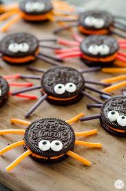 Melt the candy melts according to the package instructions, then pour the melted candy into a piping bag. Oreo Spider Cookies With Licorice Live Craft Eat