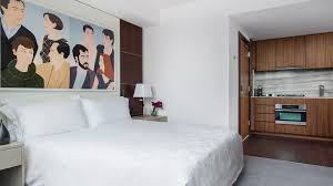 bedroom hotel room with kitchen