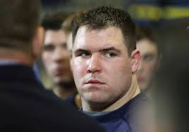 Delaware wrestler put family trauma behind him to wrestle for Navy