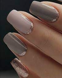 The flowers in this design are like starfish shape. Hugedomains Com Gold Gel Nails Gold Nail Designs Gel Nail Art Designs