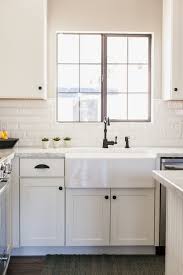 Depending on the sink you choose, there may be a need for fillers and additional bracing. White Shaker Style Cabinetry With 30 Farmhouse Sink By Rafterhouse White Farmhouse Sink White Shaker Kitchen Cabinets White Kitchen