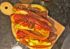 The humble hot dog is the subject of much rumor and speculation as to what it contains. Hot Dog Toppings From Chefs Across The Country