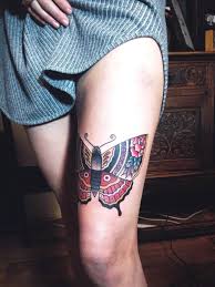 This breathtaking shoulder and upper arm tattoo. Colorful Butterfly Tattoo Design On Thighs