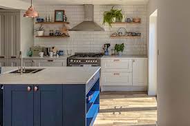 Dark grey gloss kitchen with white worktops howdens doors. Kitchen Worktops Autumn Trends 2019