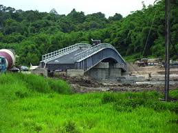 Urban areas in malaysia had a significantly lower poverty rate than rural areas. Sungai Arang Bridge Sarawak Borneo Malaysia Mabey English