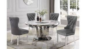 They're elegant and have sophisticated appeal, giving an additional plus to any dining room. Reyna Round Marble Top Dining Table
