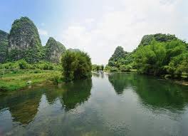 The yulong river, with its dramatic karst landscape, silky water, and ancient bridges, is a great place for bamboo rafting. Yulong River Yangshuo Yulong River Bamboo Rafting Cruise Guilin