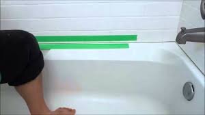 If the caulk around your bathtub is cracked or just looks very bad, apply caulk to make your bathtub look good and prevent water from leaking onto the floor. How To Get A Super Smooth Caulking Line Using Tape Youtube