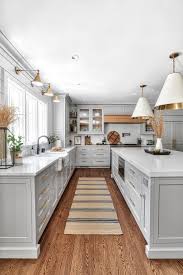 This will be a difficult process. Gray Cabinetry Brass Hardware Interior Design Kitchen Grey Kitchen Designs Home Decor Kitchen