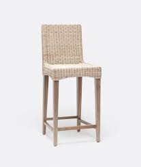 Incredibly durable, renewable, and rich in tonal variation, these swivel counter stools are handwoven of seagrass and abaca that will get even softer and more beautiful over time. Macdonald Wicker Counter Stool Mecox Gardens