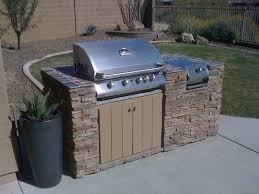 Not only will this add some pizzazz this would also be an excellent island to use in an outdoor kitchen. Eric Robstfeld Built This Wonderful Bbq Island Using Bbq Coach Frame Kits Diy Outdoor Kitchen Outdoor Kitchen Kits Outdoor Kitchen Island