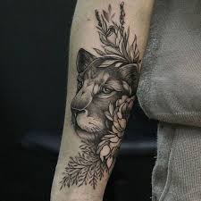 Quotes and other texts show up often in feminine designs. 1001 Ideas For A Lion Tattoo To Help Awaken Your Inner Strength