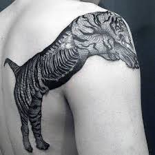 The rib cage is the arrangement of ribs attached to the vertebral column and sternum in the thorax of most vertebrates, that encloses and protects the vital organs such as the heart, lungs and great vessels. 70 Bone Tattoo Designs For Men Skeletal Ink Ideas