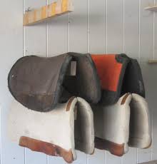 Anybody got any got good, affordable plans for some wall mounted saddle rack. Diy Saddle Racks Nickernews