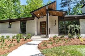 Asking 689k Decatur Ranch Juxtaposes Midcentury Contemporary Styles Ranch House Exterior Mid Century Modern Exterior Ranch Style Homes