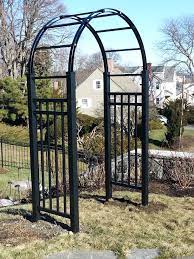 Beautiful iron garden arbor comes with matching working gate montebello iron garden arbor features intricate scrollwork Pin On Arbors And Garden Structures