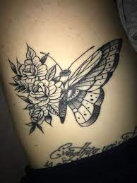 Butterfly Tattoo With Flower Wing Butterfly Wing Tattoo Butterfly Tattoo Butterfly Tattoo On Shoulder