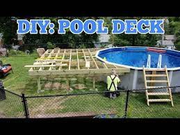 Most above ground pools are accessed with a single precarious ladder that can be difficult to climb. Diy How To Build A Pool Deck Under 500 Pool Deck Plans Pool Deck Swimming Pool Decks