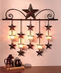 Our facility was built to allow us to manufacture and distribute wall decor worldwide. Rustic Hanging Stars Wall Sconce Candle Holder Tea Light Home Decor Rustic Star Home Decor Rustic Candle Wall Sconces Country House Decor Country Wall Decor