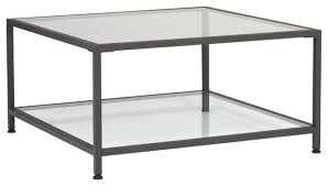 A coffee table with storage can help reduce clutter by adding extra space for remotes, throw pillows, magazines, and toys. Camber 30 Modern Metal And Glass Square Coffee Table In Pewter Clear Transitional Coffee Tables By Studio Designs Houzz