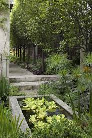 Hoerr Schaudt Garden In Chicago S Lincoln Park Garden Design Water Features In The Garden Outdoor Gardens Side Garden