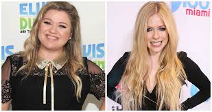 Only 17 herself when sk8er boi became a hit song, … Avril Lavigne Elbowing Kelly Clarkson At The 2002 Vmas Still Haunts Us