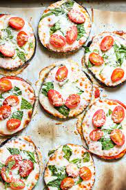 Eggplant Pizza With Spinach Cherry Tomatoes Eggplant Pizzas Eggplant Recipes Vegetarian Comfort Food