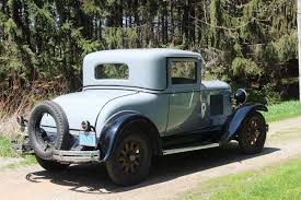 Image result for Scaraba Green 1930 Oldsmobile