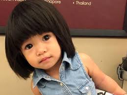 Toddler hair style so crazy it gets mistaken for a wig.