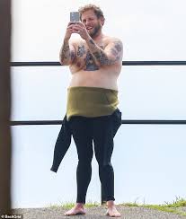 .of tattoos, jonah hill showed off some of his extensive artwork during a coffee run on saturday. Jonah Hill Pulls Down His Wetsuit In Malibu To Show Off His Bare Chest Readsector