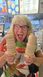 Frustrated woman eating ice cream