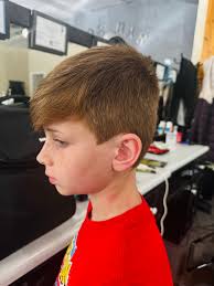 Jenny is doing a great job! These are her first haircuts!!