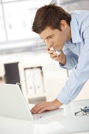 Young Office Worker On Phone Using Computer Young Office Worker Man Speaking On Sponsored Phone Computer Worker You In 2020 Worker Young Studio Photography