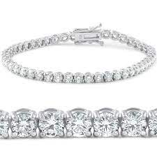 A circle clasp features two loops of metal that each attach to a post on either end of the bracelet; Pompeii3 18k White Gold 7 Ct Tdw Diamond Tennis Bracelet 7 Double Lock Clasp Lab Grown Eco Friendly G H Si1 Si2 On Sale Overstock 25463028