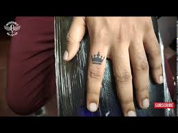 The one dot tattoo can become a symbol of transition. Crown Finger Tattoo Time Lapse Youtube