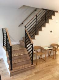Wood handrail stair railing ideas. Capozzoli Stairworks
