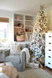 Christmas Tree Decor In Our Small Family Room Flocked Tree Pink Ornaments Small Christmas Decorations Living Room Christmas Living Rooms Small Family Room