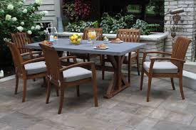 Deluxe Eucalyptus Stacking Arm Chairs With Olefin Cushions Concrete Composite Top Dining Ta In 2020 Concrete Dining Table Outdoor Dining Chairs Outdoor Dining Table