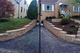 Retaining Walls Along Both Sides Of Driveway And A Retaining Wall Stone Planter Stone Planters Stone Retaining Wall Retaining Wall