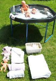 Baby born doll has her evening routine with bath time in toy bathroom, followed by dressing in her pink bedroom and bedtime story reading. Baby Doll Washing And Caring Activity The Imagination Tree