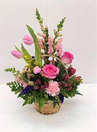 See more ideas about flower arrangements, basket flower arrangements, floral arrangements. Spring Up In Pink Basket By Floral Creations Florist
