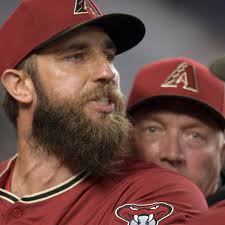 Arizona's Madison Bumgarner held back by teammates after first-inning  ejection