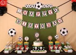 Use printed designs, like this grass table cloth to create a faux backdrop for your dessert table. Soccer Themed Birthday Party Ideas Lovetoknow