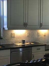 15 creative kitchen backsplash ideas How I Painted My Travertine Backsplash In Three Easy Steps